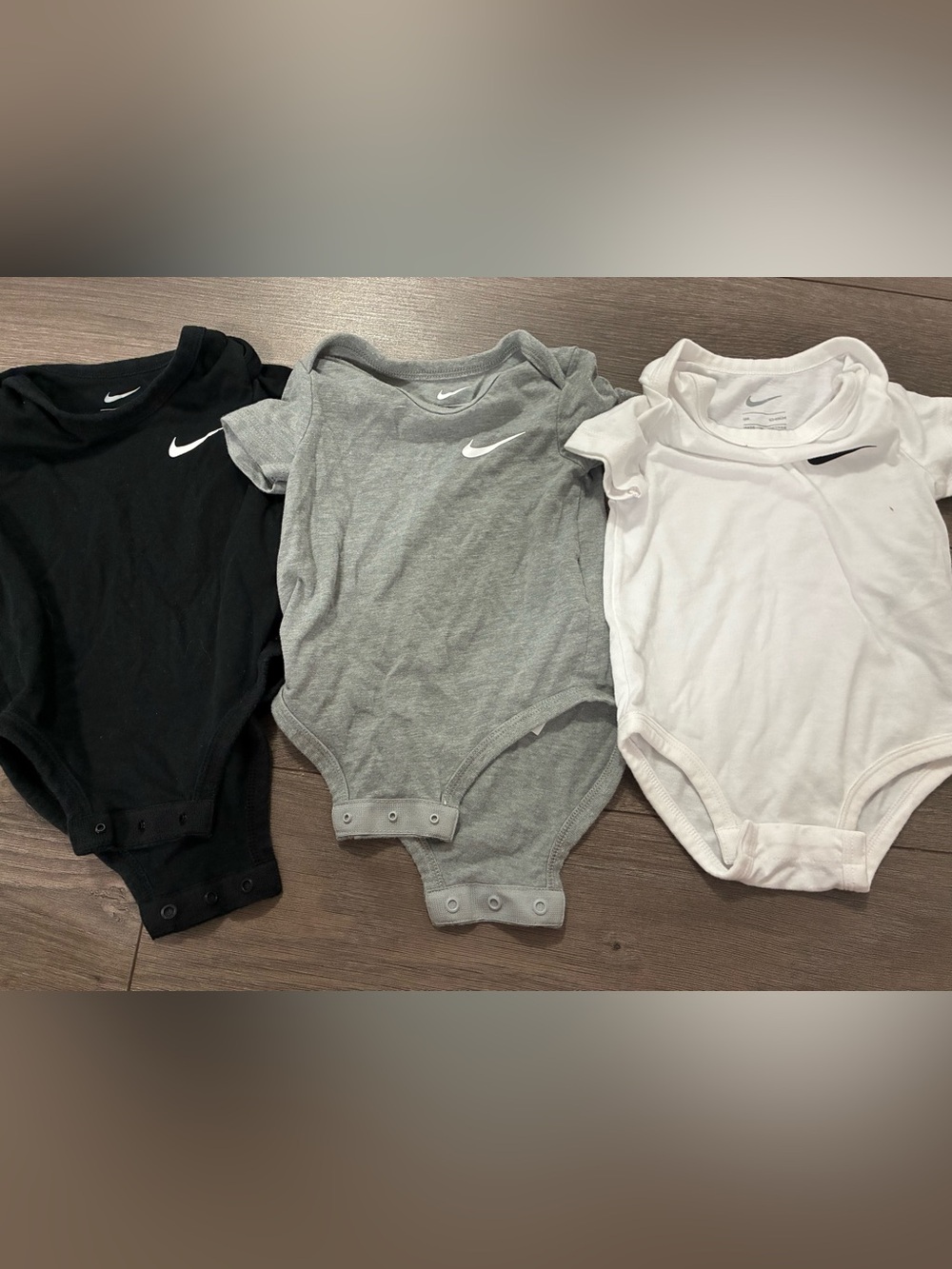 Nike Gray Short-Sleeve Infant Bodysuit with White Swoosh